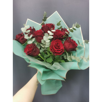 9 red roses with eucalyptus